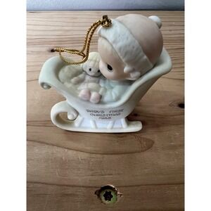 Precious‎ Moments "Baby's First Christmas" ornament from 1988
